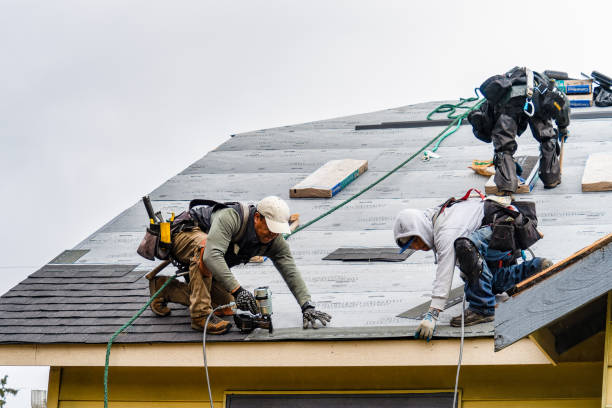 Professional Flat Roof Repair technician working in Raymond, NH